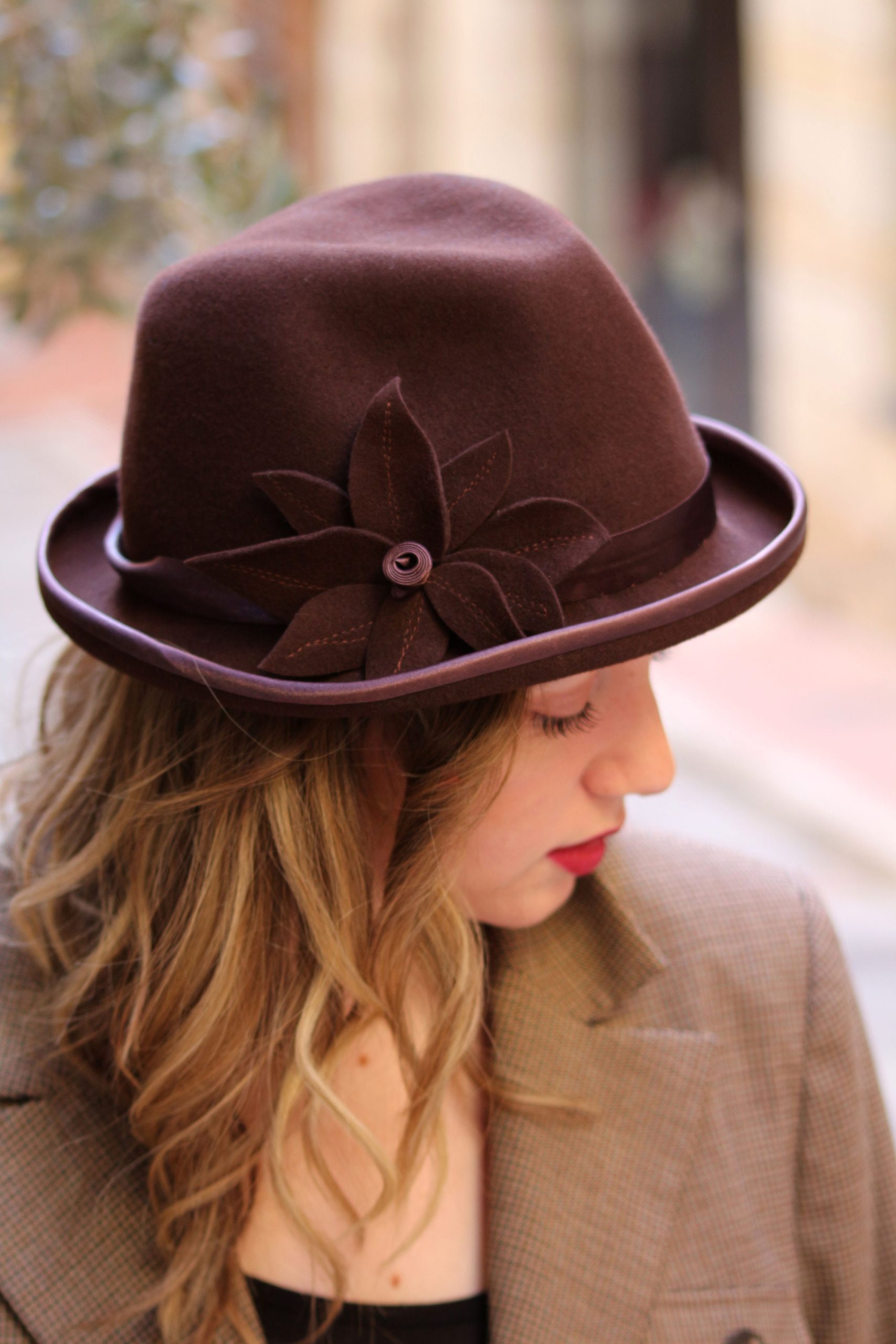 Brown wool fedora with floral embellishment